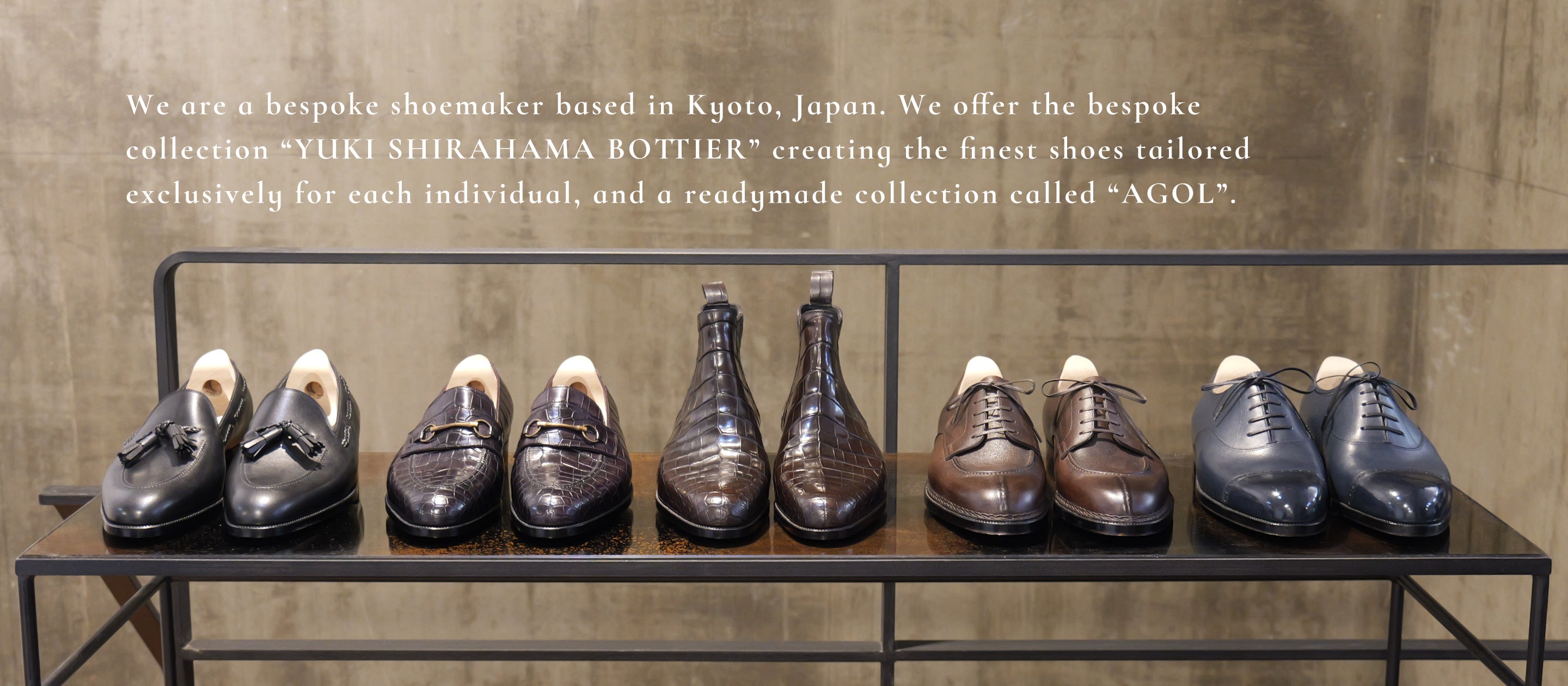 A comprehensive collection of bespoke footwear by YUKISHIRAHAMA BOTTIER, featuring black tassel loafers, exotic leather loafers, Chelsea boots, brown derby shoes, and dark navy oxfords._PC