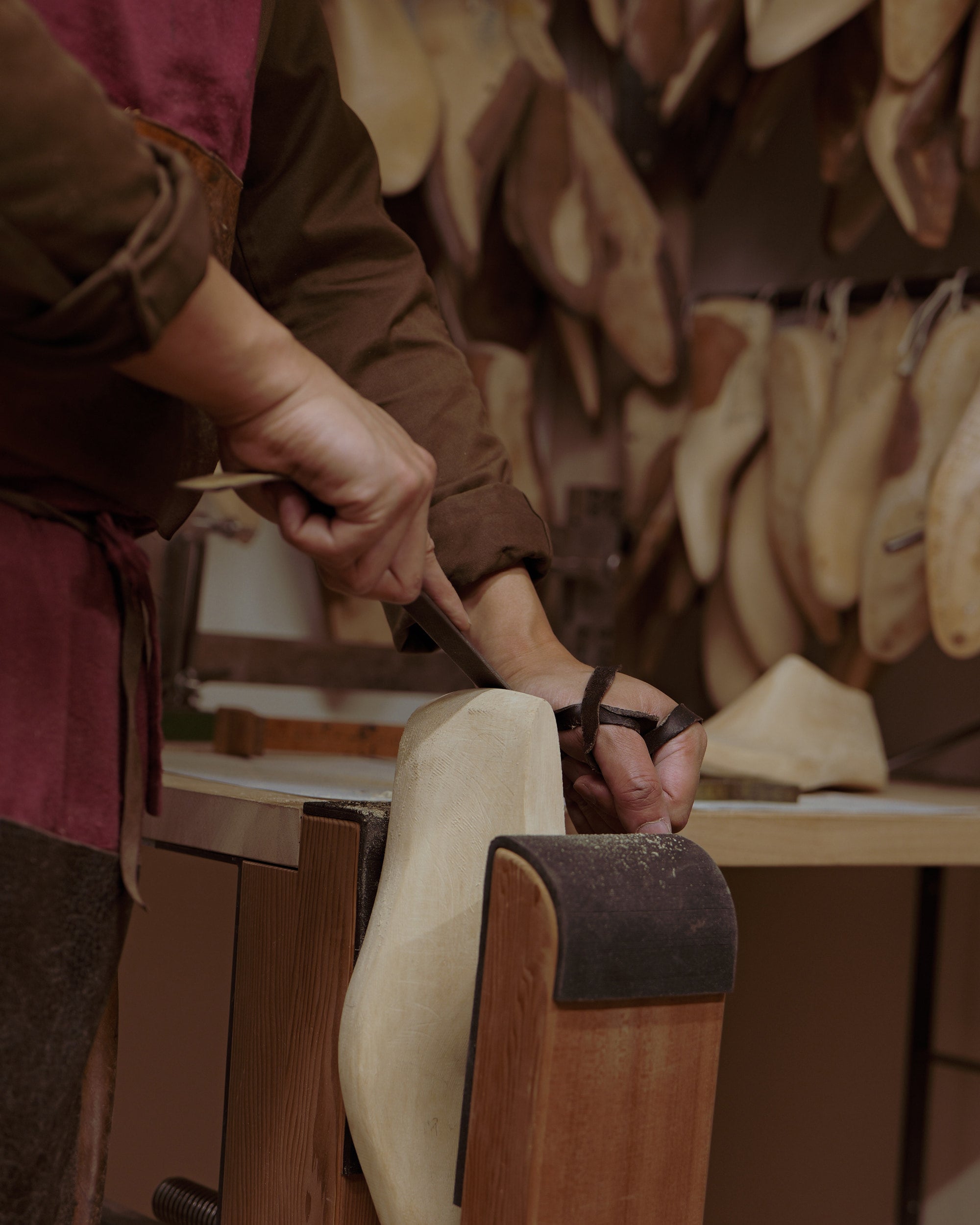 hand carving wooden last for bespoke shoes
